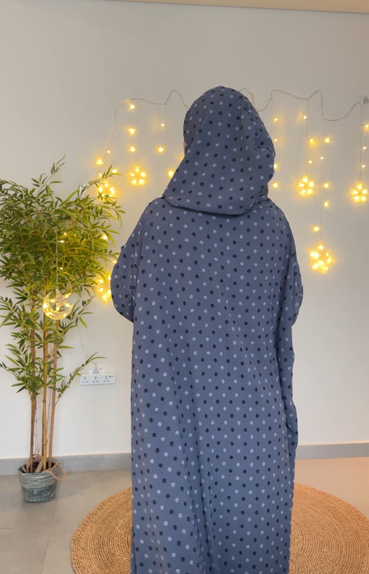 Gray burqa with black dots