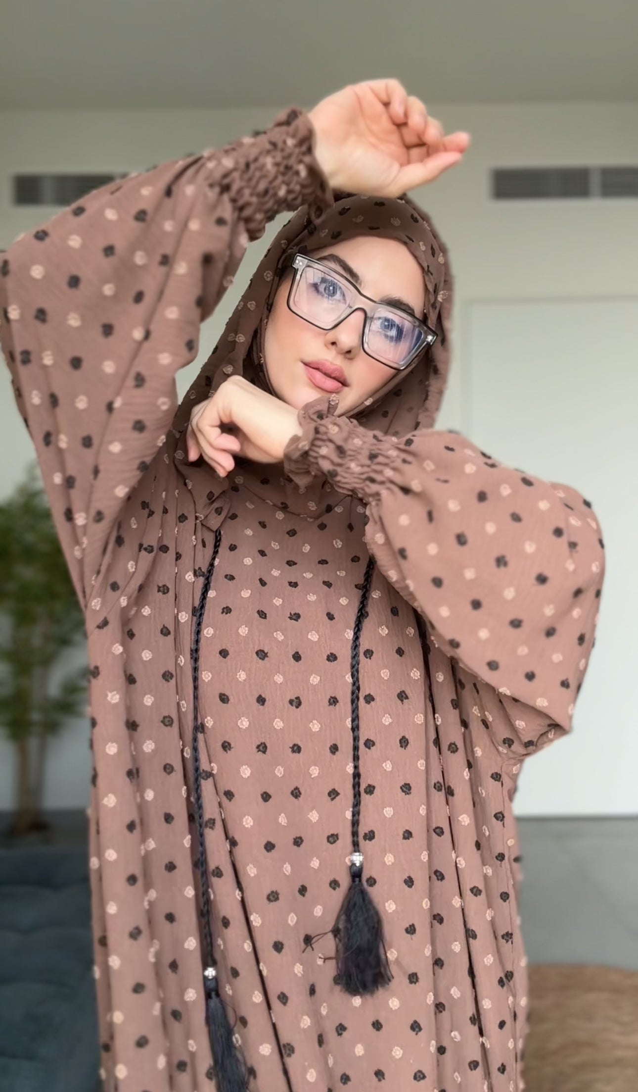 Brown burqa with black dots