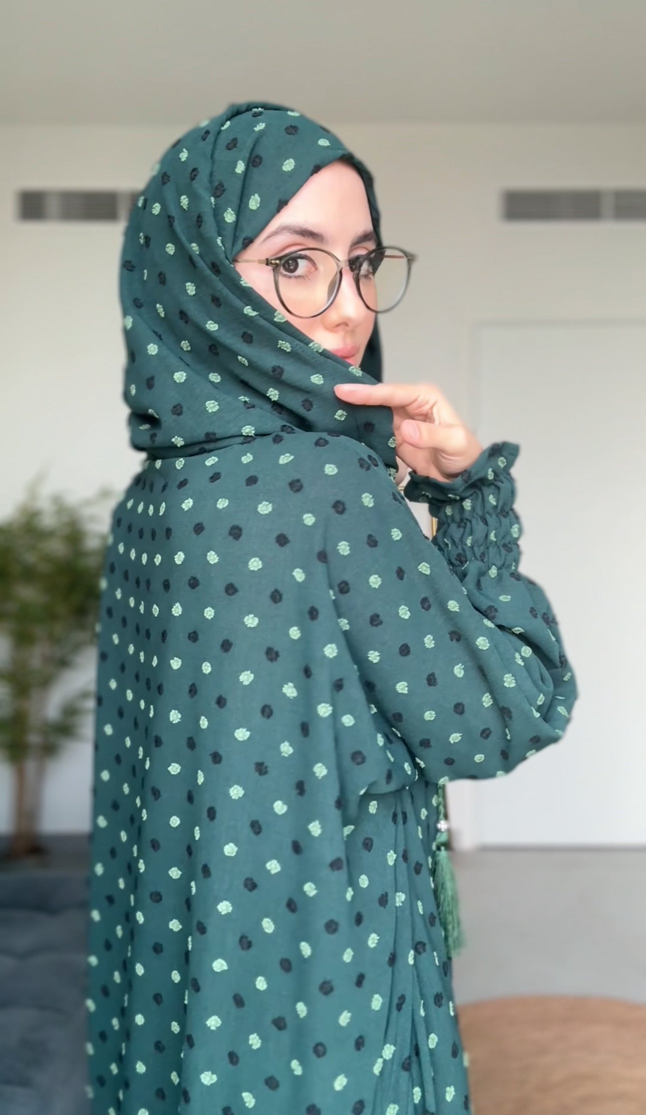 Emerald green burqa with black dots