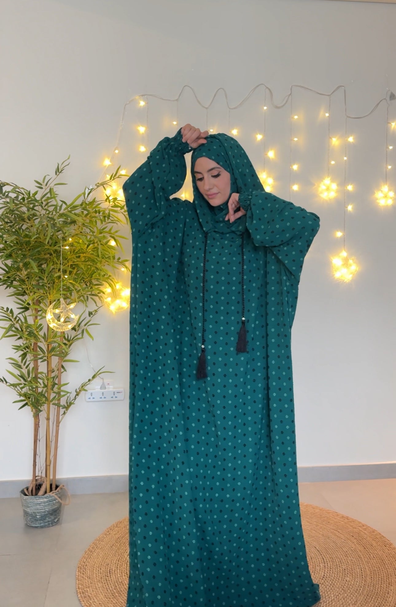 Emerald green burqa with black dots