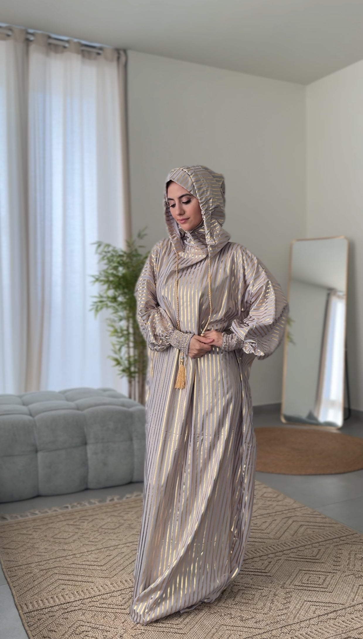 Light grey burqa with thick gold vertical lines