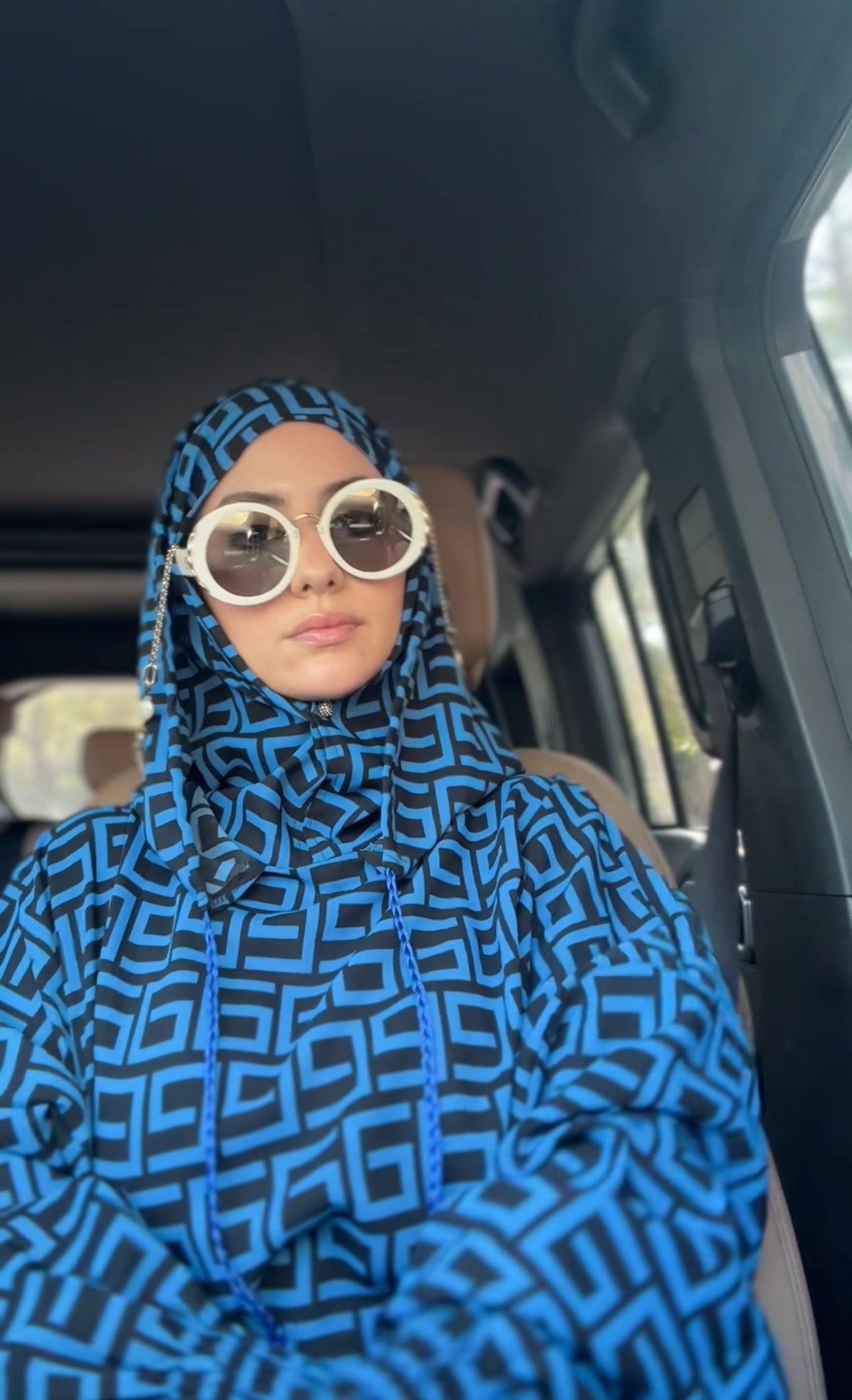 Blue burqa with black geometric lines