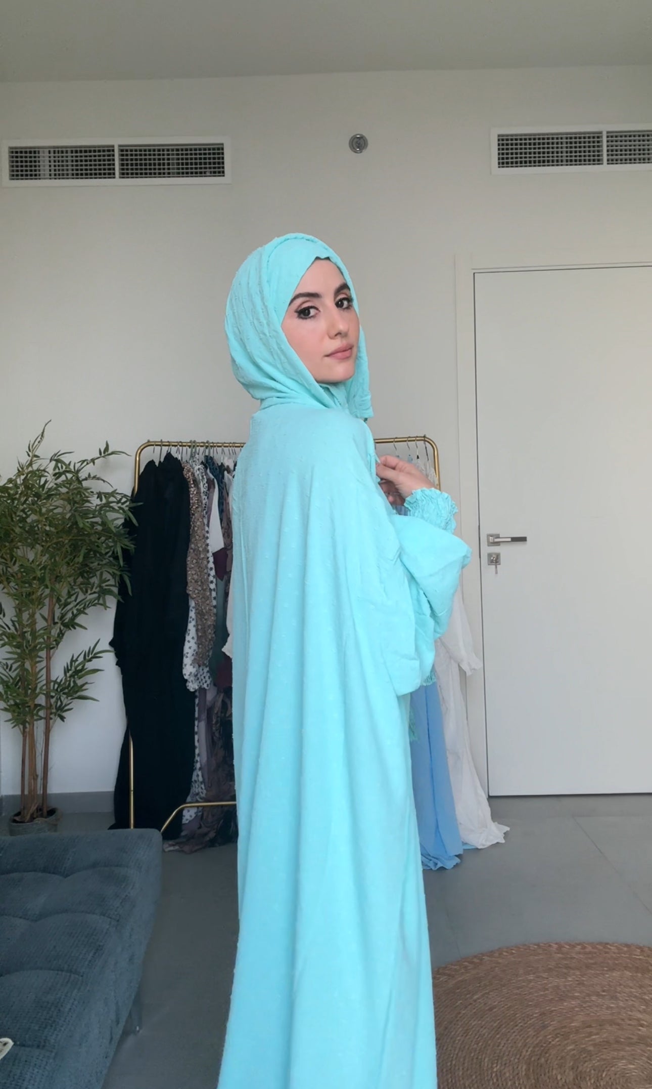 Bright blue burqa with blue dots